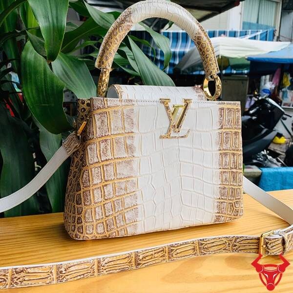 Túi da cá sấu bạch tạng nhũ vàng thời trang cao cấp.