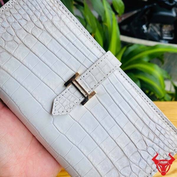 Ví cầm tay nữ da cá sấu bạch tạng